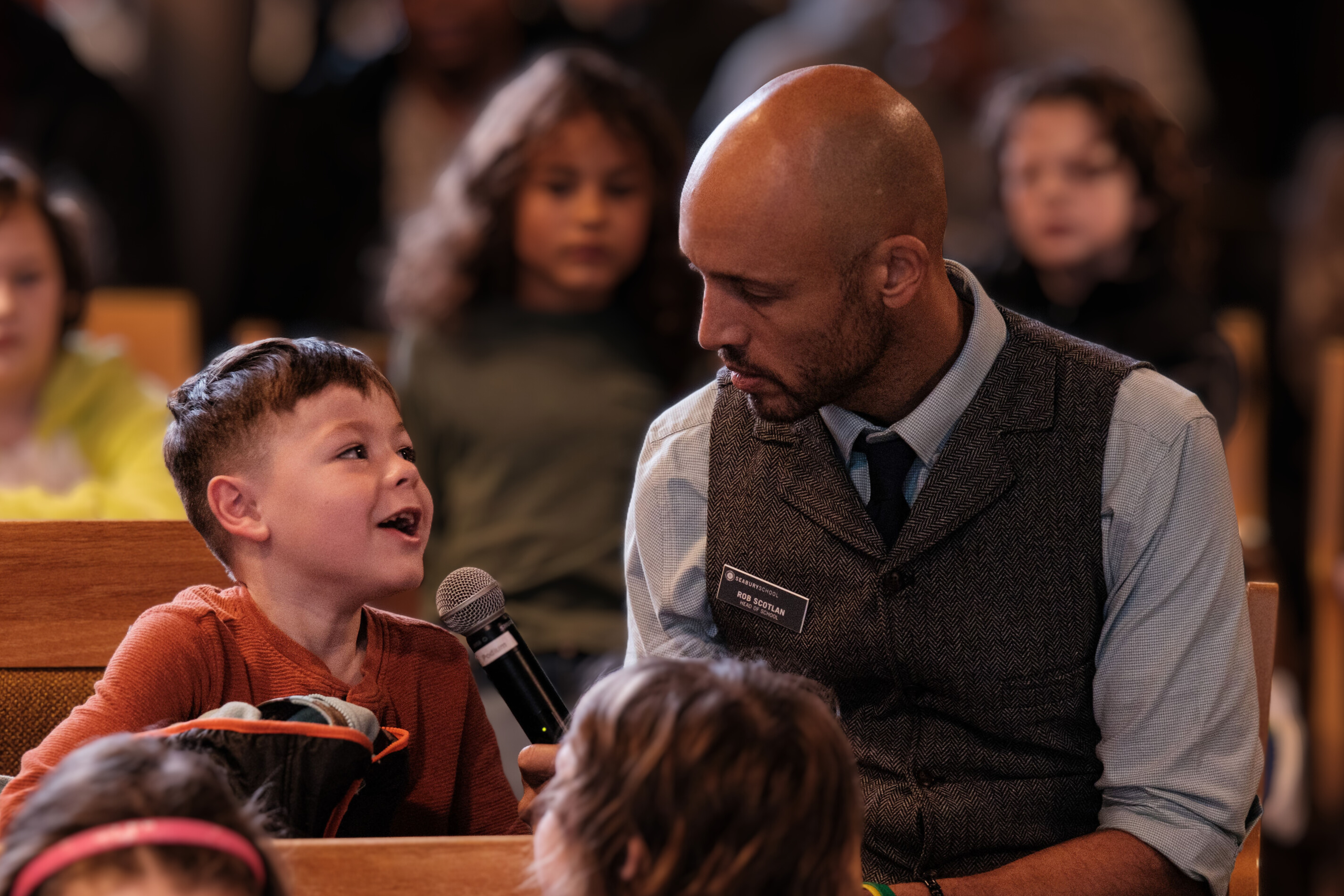 Head of School Rob Scotlan and 1st grade student at All School Gratitude Gathering